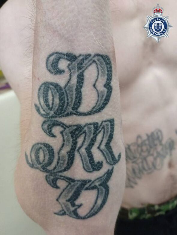 Damon had DMO tattooed on his arm