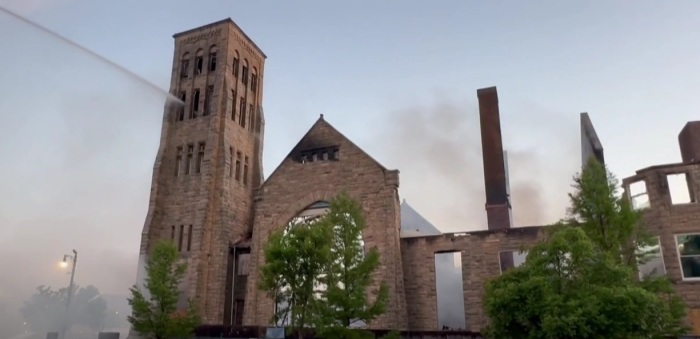 Firefighters extinguish a fire at The Clayborn Temple Church of Memphis, Tennessee, in April 2025. 