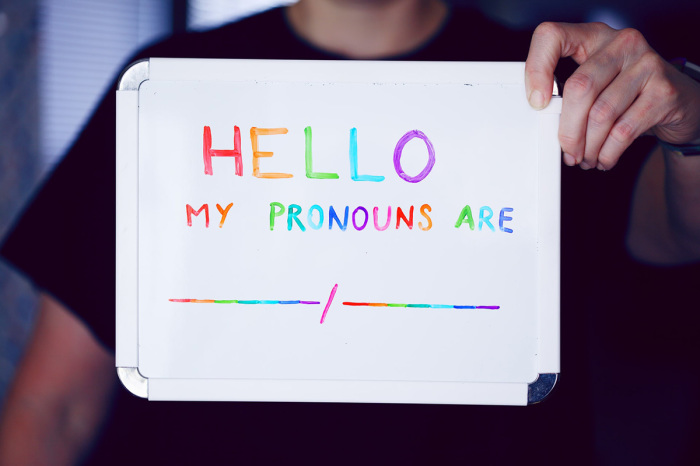 A whiteboard to fill in preferred pronouns.