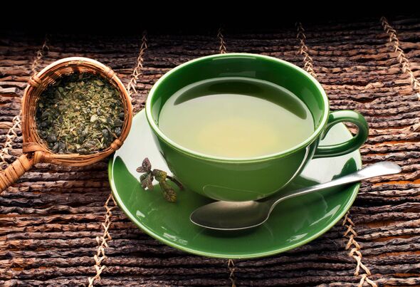Green tea drink and leaves