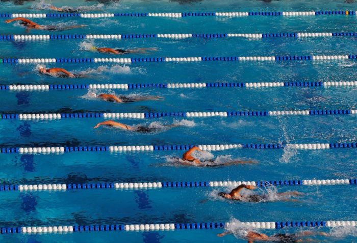 The field stays close together early in the women's 800-meter freestyle finals during the Conoco Phillips USA Swimming National Championships at Stanford University's Avery Aquatic Center on August 6, 2011, in Palo Alto, California.