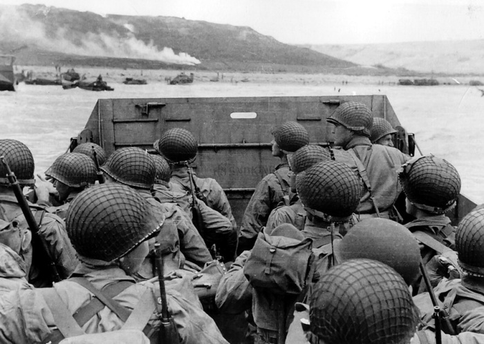 American soldiers in a landing craft approaching Omaha Beach during the landings at Normandy, France on 'D-Day', June 6, 1944.
