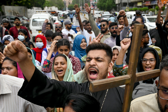 Pakistan minority rights campaigners protest the sentencing of a Christian man to death for sharing an allegedly blasphemous TikTok post, in Karachi on July 2, 2024. In an order released on July 1, a Christian man was sentenced by an anti-terror court for reposting an image of a torn and defaced Quran alongside online accusation against two Christian brothers who were originally arrested for blasphemy but released after investigators believed they were framed over a personal grudge, according to domestic media.