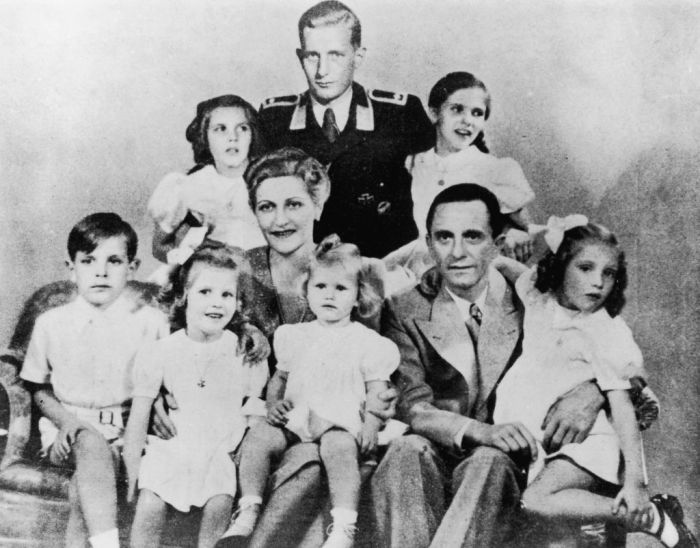 German Nazi politician and minister of propaganda Paul Joseph Goebbels (1897 - 1945) with his wife Magda and their children, Helga, Hildegard, Helmut, Hedwig, Holdine and Heidrun, 1942. Also present is Harald Quandt (in uniform), Magda Goebbels' son by her first marriage. With the fall of the Third Reich, Magda and Josef Goebbels poisoned their six children before themselves committing suicide.