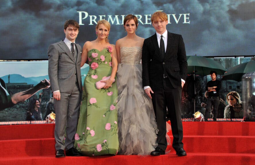 LONDON, ENGLAND - JULY 07: Actor Daniel Radcliffe, writer J.K. Rowling, actress Emma Watson and actor Rupert Grint attend the "Harry Potter And The Deathly Hallows Part 2" world premiere at Trafalgar Square on July 7, 2011 in London, England. (Photo by Jon Furniss/WireImage)