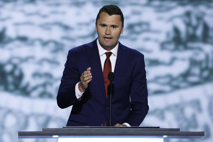 CEO of Turning Point USA Charlie Kirk speaks on stage on the first day of the Republican National Convention at the Fiserv Forum on July 15, 2024, in Milwaukee, Wisconsin.