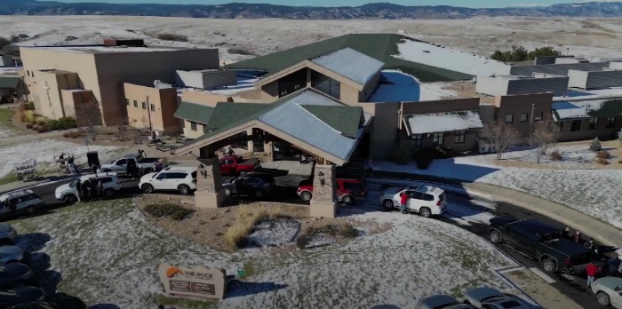 Cars are parked outside the Church of the Rock, also known as the Rock Church, a non-denominational congregation in Castle Rock, Colorado.