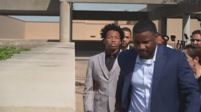 Dominique Alexander (right) walks with Karmelo Anthony, who was indicted in June for the murder of Austin Metcalf in Frisco, Texas.