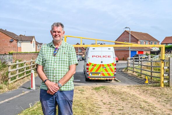 man by police