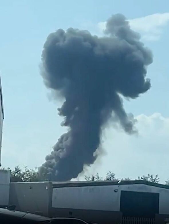 Black smoke rising from the site of the crash