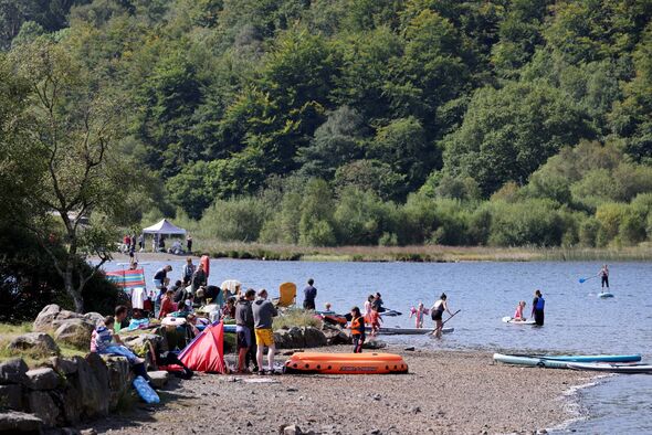 When the sun comes out at Llyn Geirionydd, so do the crowds, seen here at the lake's southern end