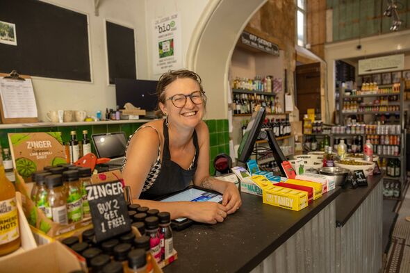 Alice Cleaver behind the counter of her shop