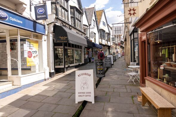 Frome shopping street with small waterway in centre