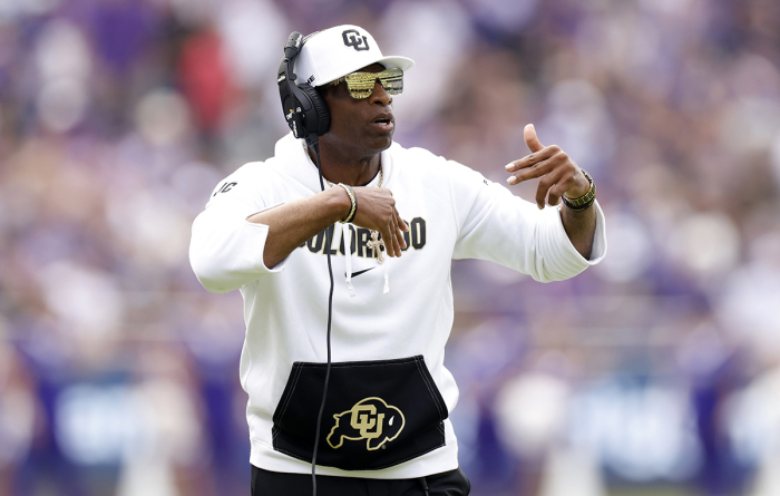 Head coach Deion Sanders of the Colorado Buffaloes calls a play against the TCU Horned Frogs during the first half at Amon G. Carter Stadium on September 2, 2023, in Fort Worth, Texas.