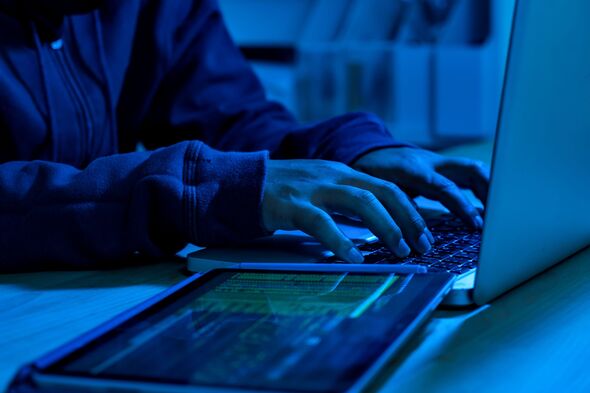 Wanted hackers coding virus ransomware using laptops and computers. Cyber attack, system breaking an