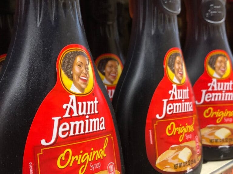 26 June 2020, US, New York: Syrup bottles from "Aunt Jemima" are in a supermarket. US food giant Pepsi is giving its 130-year-old "Aunt Jemima" brand a new look. The mascot so far: a black woman as a friendly servant. There is to be a new start this year. (to dpa-Korr "Popstars, Uncle Ben's and Co.: Racism debate leads to rethinking") Photo: Benno Schwinghammer/dpa (Photo by Benno Schwinghammer/picture alliance via Getty Images)