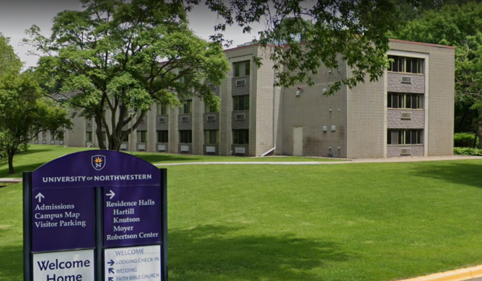 A sign welcomes visitors and students to the University of Northwestern-St. Paul in Roseville, Minnesota.