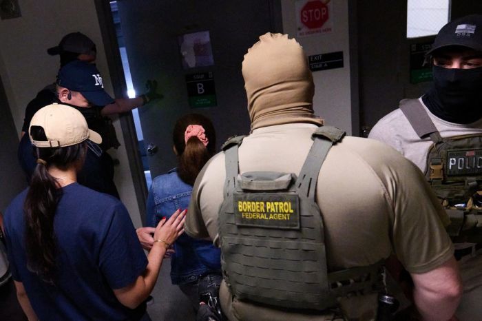 U.S. federal agents working for Immigration and Customs Enforcement (ICE) detain immigrants and asylum seekers reporting for immigration court proceedings at the Jacob K. Javits Federal Building's U.S. Immigration Court in New York, New York, Thursday, July 24, 2025. 