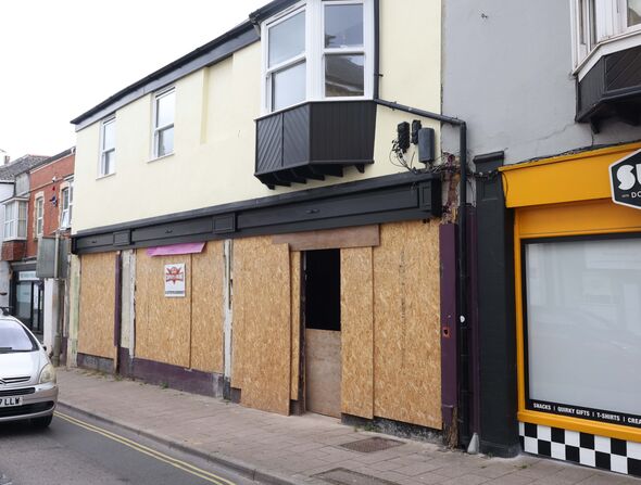 boarded up shops