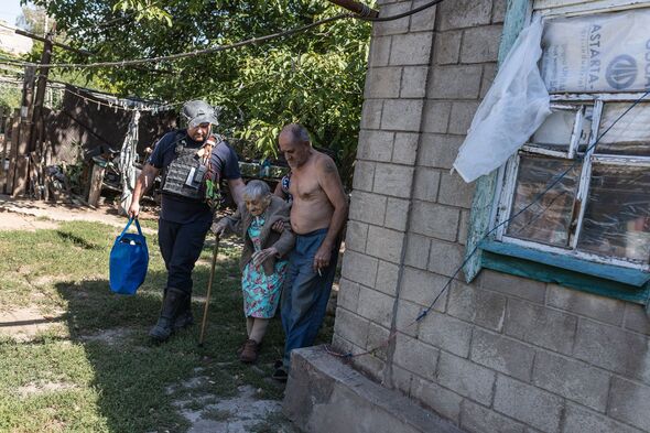 Emergency service workers evacuate civilians from Ukraine's Kostiantynivka