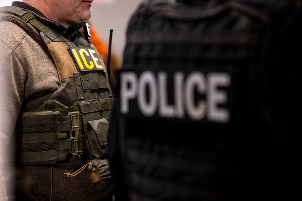 US Immigration and Customs Enforcement (ICE) agents, along with other federal law enforcement agencies, attend a pre-enforcement meeting in Chicago, Illinois, US, on Sunday, Jan. 26, 2025. President Donald Trump has pledged to carry out the largest deportation effort in US history, vowing to ultimately deport all of the foreigners living in the country without permission.