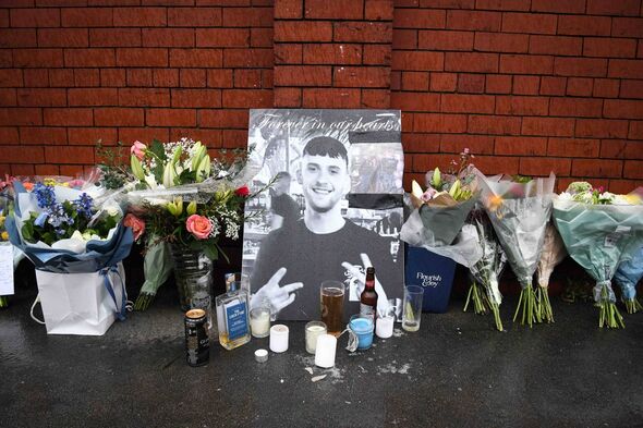 Tributes at the scene where Ryan Evans was killed