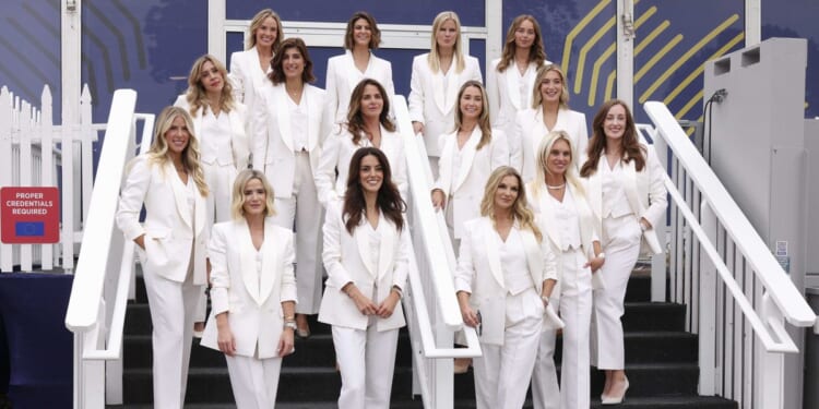 Team Europe WAGs pose in all white as Luke Donald aims dig at Team USA