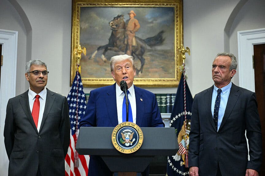 US President Donald Trump (C), alongside Secretary of Health and Human Services Robert F. Kennedy Jr. (R) and National Institute of Health (NIH) Director Jayanta Bhattacharya (L), speaks during a news conference about prescription drug prices, in the Roosevelt Room of the White House on May 12, 2025, in Washington, DC. (Photo by Jim WATSON / AFP) (Photo by JIM WATSON/AFP via Getty Images)