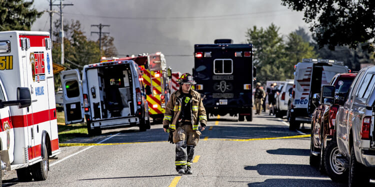 Gunman kills 1, wounds several after crashing car into LDS church