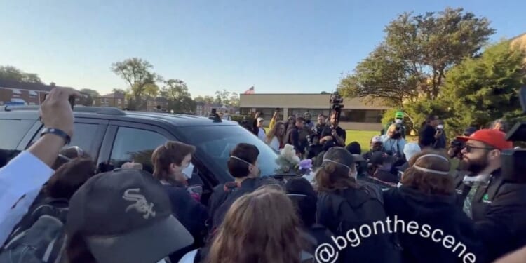 Armed Rioter Arrested As Protesters Try To Block ICE Agents From Driving Into Illinois Facility