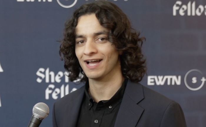 Michael Iskander appears at the red carpet premiere of 