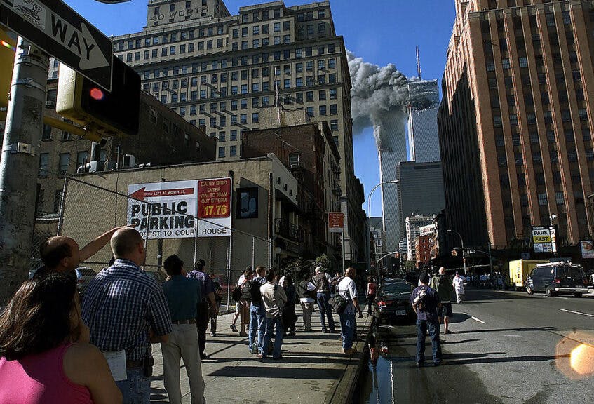NEW YORK CITY - SEPTEMBER 11:  (FILE PHOTO) (PUERTO RICO OUT)  This is a view from West Broadway Avenue of the downtown Manhattan area of the World Trade Center towers after they were hit by two planes during a terrorist attack September 11, 2001 in New York City.  (Jose Jimenez/Primera Hora via Getty Images) ***PUERTO RICO OUT ****