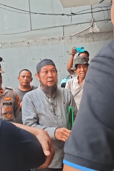 Muslims protest at site of church in commercial complex in Gerendeng, Pulo village, Tangerang, Indonesia on Sept. 21, 2025. 