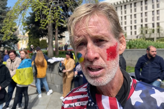 This screengrab taken from AFPTV on Sept. 16, 2024, shows Ryan Wesley Routh speaking during an interview at a rally to urge foreign leaders and international organizations to help provide humanitarian corridors for the evacuation of civilians and Ukrainian servicemen from Mariupol in central Kyiv on April 27, 2022, amid Russia's invasion of Ukraine. U.S. media said it was Routh, 58, who was arrested after U.S. Secret Service agents 