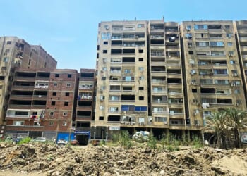 Why does Cairo have so many unfinished buildings?