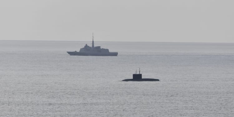 Submarine in English Channel an 'explosion risk' as Nato monitors Vladimir Putin's vessel
