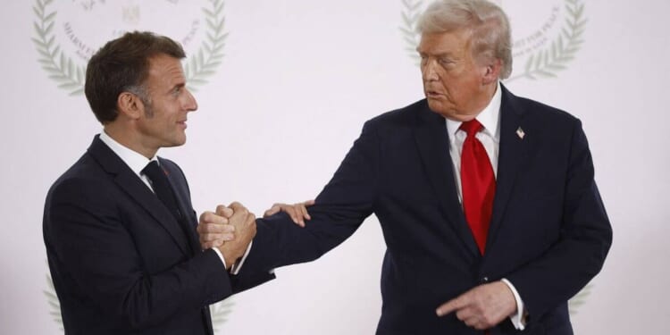 Donald Trump's 5-word threat to Emmanuel Macron during tense handshake | World | News