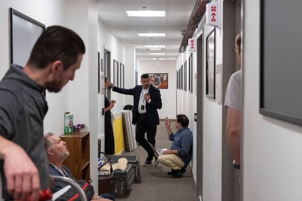 Members of the media pack up their belongings in the press area of the Pentagon, Wednesday, Oct. 15, 2025 in Washington. (AP Pho