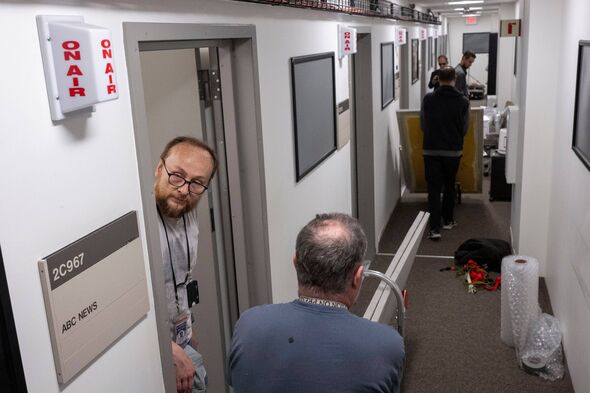 Members of the media pack up their belongings in the press area of the Pentagon, Wednesday, Oct. 15, 2025 in Washington. (AP Pho