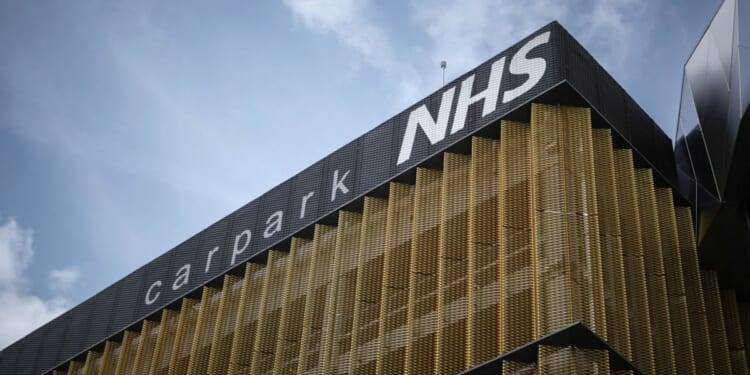 Thousands of NHS staff slapped with parking fines for 'being at work'