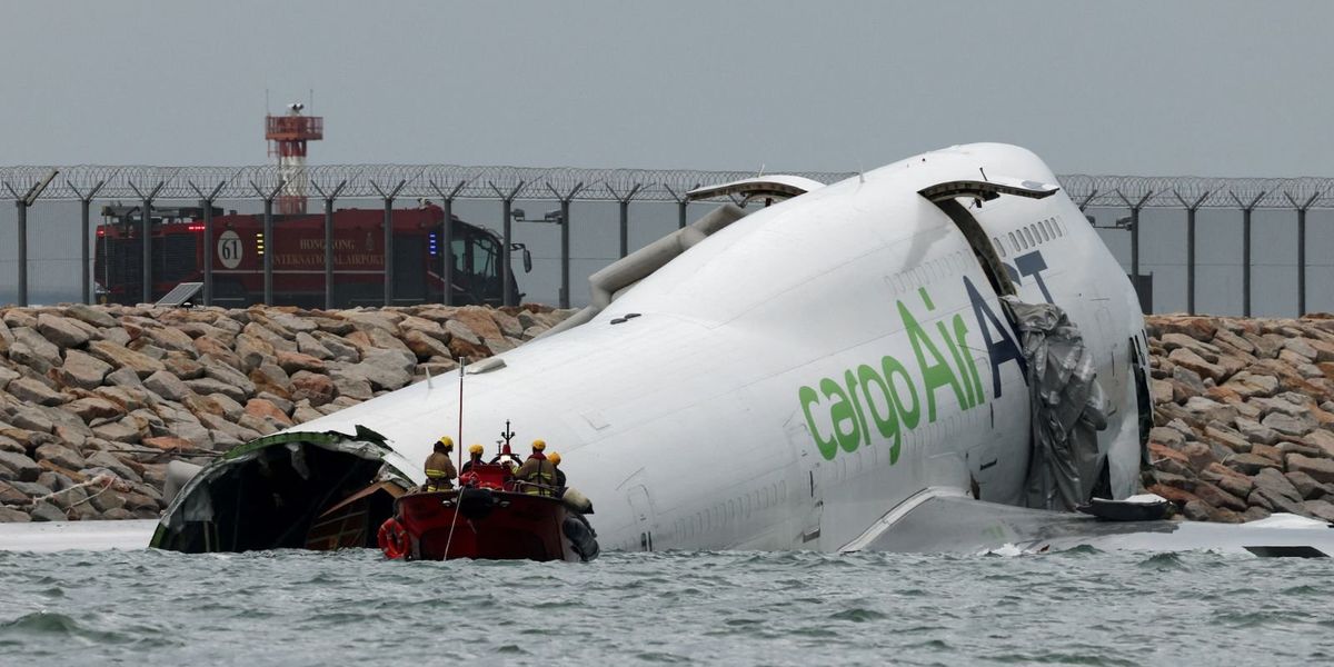 One missing after aircraft slides off runway into sea