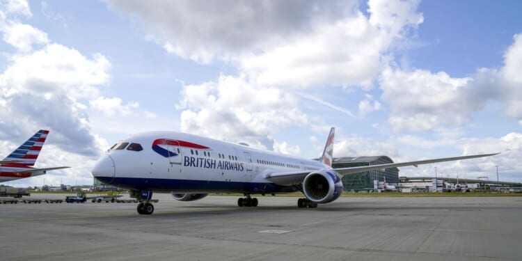 British Airways flight cancelled after 'numbskull' driver's van careers into jumbo jet