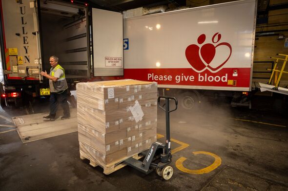 Frozen plasma is loaded onto a freezer lorry Frozen plasma is loaded onto a freezer lorry