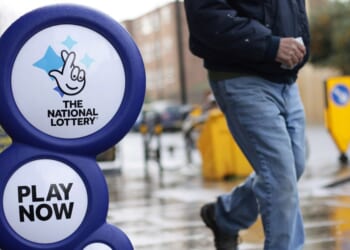 National Lottery winner was 'getting signs to play on that particular day' before scooping up mega jackpot