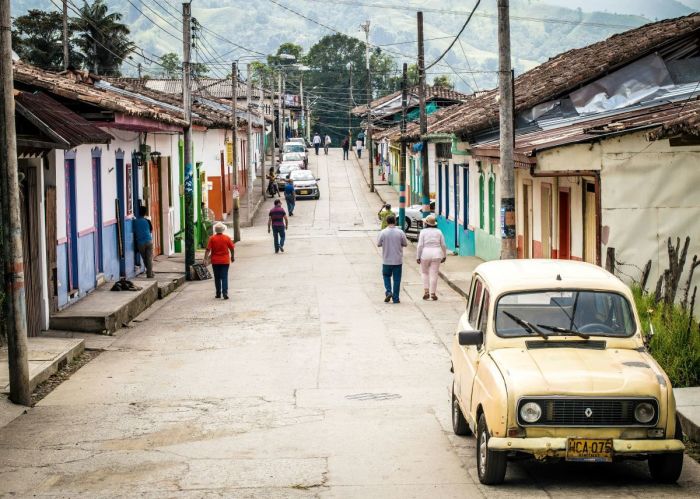 People walk on the street in Salento, Colombia.