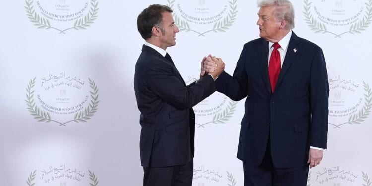 Lip reader decodes Trump’s five-word threat to Macron in gripping handshake | US | News
