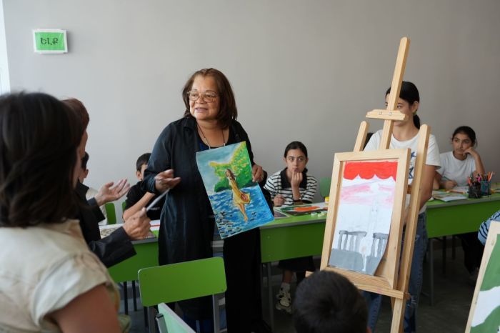 With the help of a translator, Alveda King (middle) speaks with children at the Community and Family nonprofit therapy center in Metsamor, Armenia, on Sept. 25, 2025.
