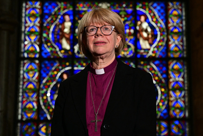Britain's new Archbishop of Canterbury-designate, Sarah Mullally, poses for a photograph in The Corona Chapel at Canterbury Cathedral, southeast England on Oct. 3, 2025, following the announcement of her posting. Sarah Mullally was named the new Archbishop of Canterbury, the U.K. government announced, becoming the first woman to lead the Church of England in its history. Her nomination by a committee has been approved by King Charles III, the government said. 