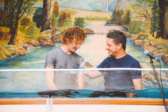 Pastor Albert Oliveira (right) leads a baptism service on July 23, 2025, at First Baptist Church (FBC) Gordon.