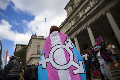 Trans activists and their supporters rally in support of transgenderism on the steps of New York City Hall, October 24, 2018, in New York City. The group gathered to speak out against the Trump administration's stance on there being two sexes and not innumerable genders. Last week, The New York Times reported on an unreleased administration memo that proposes a strict biological definition of sex based on biology.